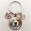 Fluffig hund glas cabochon nyckelchain smart patient och barnvänlig fransk bulldog nyckelkedja män kvinnor smycken gåva