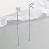 Pendientes de tuerca de moda Mori Bowknot Earline temperamento femenino nutritivo agujero de oreja cara reveladora delgada larga Súper Hada Earr