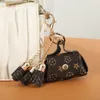 Leather Pouches Keyring Rings Jewelry Brown Flower Plaid Tassel Coin Purses Car Key Chains Holder Cute Fashion Design Women Bag Pe1449598