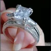 Pierścionki ślubne Kobiety Big Biżuter Pierścień księżniczka Cut 10ct Diamond Stone 300pcs CZ 925 Sterling Sier Sier zaręczynowy prezent ślubny Downot Dhmfp