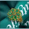Fedi nuziali Anelli di barretta del fiore dello zircone verde per le donne Colore oro Scava fuori i gioielli della festa di fidanzamento di nozze Bague Femme Drop Deli Dhcwu