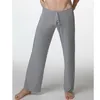 Pantalon pour hommes sexy mâles de sommeil de la gaze à fond sans fond sans glace de yoga mince et taille respirante ménage transparent