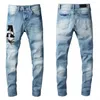 Mäns jeans Mens Jeans Högkvalitativ nödställd motorcykelcyklist Jean Hole Skinny Slim Tight Ripped Trip Fashionable Snake Embroidery Denim Pants