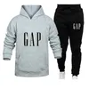 Männer Trainingsanzüge Neue Jogger Anzug für Männer Hoodies Hosen 2 teile/sätze Sweatshirt Jogginghose Männlichen Turnhallen Tops Hosen Sportswear