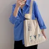 Sacs de soirée femmes toile sac à bandoulière lettres bleues grande capacité fourre-tout femme décontracté coton tissu sacs à main filles Simple Shopping livre