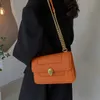 Sacs de messager Femmes 2022 Spring Nouveau simple one épaule crossbody qi tête petit carré sacq