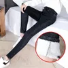 Damskie dżinsy damskie aksamitne w rozmiarze aksamitne mama czarna rozciągnięcie chuda kobieta biuro Office Pencil Pants Dżinsowe spodnie zima