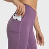 Pantalons de yoga pour femmes taille croisée leggings de sport tenue sacs d'insertion double face sans T-line pantalon court à hanches haute élastique Nouveau en Europe et en Amérique VELAFEEL