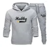 Survêtements pour hommes Tenues de couple Sweat à capuche et pantalon 2 pièces de haute qualité Hubby Wifey Imprimer Hommes Femmes Quotidien Décontracté Sport Jogging Costume Survêtement