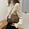 Purses Women's Bag 2022 Autumn and Winter Versatile Handheld armpit bag Western style ribbon one shoulder cross body women's