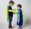 Costumes drôles d'Halloween Poncho Dinosaur Cosplay Cape With Gloves Couleurs doubles Couleurs d'anniversaire