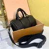 Büyük kapasiteli el çantası lüks erkek tasarımcı duffle çantaları kadınlar gerçek deri seyahat çantası moda crossbody black bagaj üzerinde taşıma tote