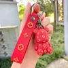 Porte-clés Violent ours clé silicone caoutchouc souple cartable poupée voiture pendentif petit filet rouge mignon