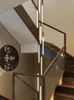 Ljuskrona kristall modern ledd gyllene svart duplex villa spiral trappa lampa vardagsrum långt rör interiör dekorativ belysning