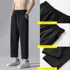 Pantalones de hombre a la moda 2022, informales, elásticos, finos, de gran tamaño, 4XL, de franela, deportivos, sueltos, versátiles, rectos para hombres