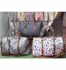 Duffel Bags Chegada Fashion Canvas Leopard Duffle Bag Women Women Overnight Large Tote Tote colorido Vaca Daminadas Bolsa de ombro