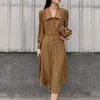 Vestidos casuais mulheres outono de peito de peito puil de couro comprido com cinto de manga longa vintage midi vestido moda elegante femme solto