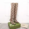 مصمم العلامة التجارية Boots Boots في الكاحل أحذية فاخرة أحذية محبوكة على سطح الخنجر طويل القامة في الركبة.