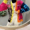 Nuove collezioni Couture Fashion Leopard Splicing Flower Color Cardigan lavorato a maglia con scollo a V Moda coreana