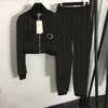 Personlighetsficka kvinnor spårningsdräkter modebrev Jacquard Coat Pants 2 färger dragkedja jackor sportbyxor set