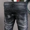 Nieuwe herenjeans Blue Bleach Jeans Tidy Biker Denim Jean Paint Spot Schade Slim Fit noodlijdende cowboypants man