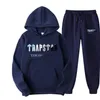 남자 Tracksuits FW22 TRAPSTAR 인쇄 Streetwear 남자 여자 Tracksuit 양 털 따뜻한 두 조각 세트 까마귀 바지 스웨터 조깅 남성 221019