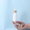 White Porcelain Glass Bottle 10-100ml Essential Oil E Liquid Thick Container with Bamboo Wooden Cap
