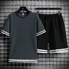 Men's Tracksuits Men sets curtos conjuntos de verão coreano de grande tamanho masculino de mangas curtas T-shirt shorts esportivos de 2 peças M-5xl