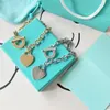 Heart shaped necklace with designer bracelet Luxury women's fashion suit Brand jewelry with packaging box Social gathering gi290T