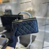 22SS Women Luxury Designer Cosmetic Bag مع مرآة شبكة جلدية صغيرة مبطن الجذع Mini Classic Zipper Counter Bag Bags Trend 306H