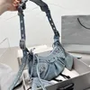 Handtassen schoudertas mode denim cowhide crossbody tassen klinknagel boren zipper sluiting geplooide portemonnee met kaartzak cardio￯de hangende spiegel verstelbare riem