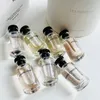 Unisex neutralne perfumy spray 10 ml 7pcs róża/ etoile Filante/ Cceur Battant/ Attrape-Reves/ Matiere Noire/ Le Jour se leve/ heures z darmową dostawą