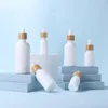 White Porcelain Glass Bottle 10-100ml Essential Oil E Liquid Thick Container with Bamboo Wooden Cap