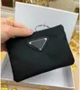 Designer de luxo Chave -chave de nylon bolsa de tela masculino Meni Mini Walets Keychains Black zip bolso de bolso amante de cartas de cartas