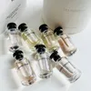 Ensemble de parfum en gros 10 ml 7pcs Rose / Etoile Filante / CCEUR BATTANT / ATTRAPLE-REVES / MATIEER NURE / LE JOUR SE LEVE / HEURES D'absence avec boîte-cadeau duré