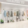 Clothing store display rack Commercial Furniture Wall mounted stainless steel wiredrawing women's cloth shop side mounted clothes racks