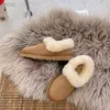 نساء فائقة الثلج Mini Mini Slipper شتاء جديد شهير في الكاحل من جلد الغنم الفراء الحفاظ على أحذية دافئة مع حقيبة غبار البطاقة US4-12 هدايا جميلة