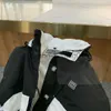 メンズダウンパーカーデザイナーチャンネルパフジャケットメンズレディース秋の冬の白いアヒルの肥厚した長いツールファッションブランドビンテージ大きなルーズコート
