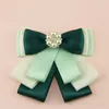 Bow Ties İngiliz erkekler düğün takım elbise boyun gömlek pimi klipler kravat çocuk kız alaşım inci rhinestone kravat kurdele bowtie