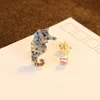 Nouvelles boucles d'oreilles asymétriques S925 plaqué argent or 18 carats Zircon hippocampe boucles d'oreilles Europe et Amérique populaires femmes boucles d'oreilles haut de gamme bijoux cadeau de saint valentin spc