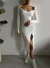 Robes décontractées automne hiver élégant coupe basse moulante blanc robe pull mi-longue pour les femmes 2022 à manches longues noir tricoté fête