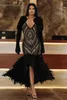 Luksusowe czarne pióra hi-lo sukienki balowe cekiny z koralikami sukienki na imprezę syrenę