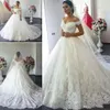 Suknie ślubne Arabia Cap Suknie ślubne Dubai Dubai Lace Appliques Plus Size Court Train Formal Stuns