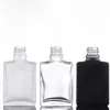 Flacon compte-gouttes en verre carré en gros 30 ml contenant d'huile essentielle givré noir clair avec bouchon noir argent doré