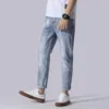 Herr jeans vår och höst tunn ljus färg hål mode märke avancerad Harlan Little Feet Soft Men's Slim Fit Casual Personality