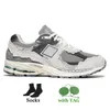 B2002R Sneakers NB 2002r Running Shoes Offs Women Mens Suede Protection Pack Rain Cloud Dark Navy Bone Light Grey Camo Black White Trainers