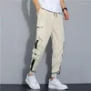 メンズパンツストリートウェアブラックメンズ韓国スタイルの弾性ウエストスウェットパンツバギースプリングヒップホップハラジュクズボンの男性服