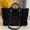 Bolsas de noite de luxo femininas clássicas Pearl Tote Canvas Beach Designers Ombro Portátil Grande Capacidade Grande Senhora Mochila Fábrica Online 70% Venda