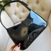 Schulter Frauen Designer-Einkaufstasche Y Unterarm Luxus Lackleder glänzend reflektierende Mode Europa und Amerika Crossbody weibliche Clutch Geldbörse