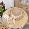 Chapeaux filles chapeau de soleil été femmes bébé enfant enfants paille plage protection nœud papillon perle luxe mignon fille Sumemr